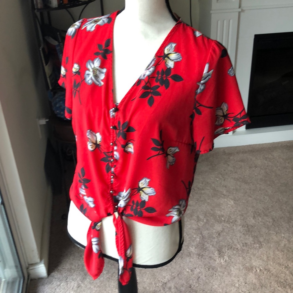 Red floral blouse